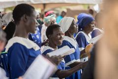 3 April 2022, Palorinya settlement, Obongi district, Uganda: A group of women from the Mother's Union of the Episcopal Diocese of Kajo-Keji sing during Sunday service on the fifth Sunday of Lent at the Macedonia church in Palorinya refugee settlement, West Nile area of northern Uganda.